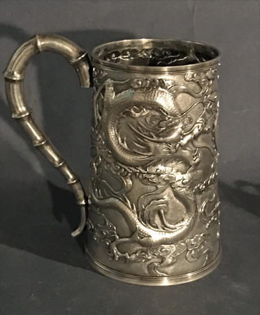 Very Large Chines Silver Dragon Decorated Tankard.